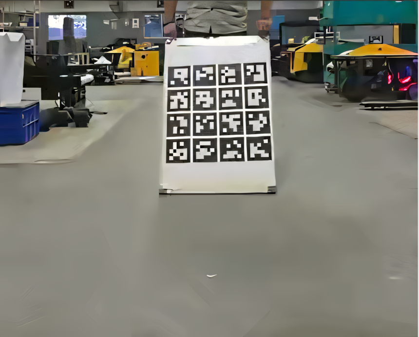 Figure: We collect camera images with the calibration target at different orientations and distances to ensure that the calibration target has sufficient useful information to estimate reliable and unique calibration parameters. Note that this is done both for intrinsic and extrinsic calibration. Camera image of an ArUco calibration target at a different orientation and distance for intrinsic and extrinsic camera calibration.